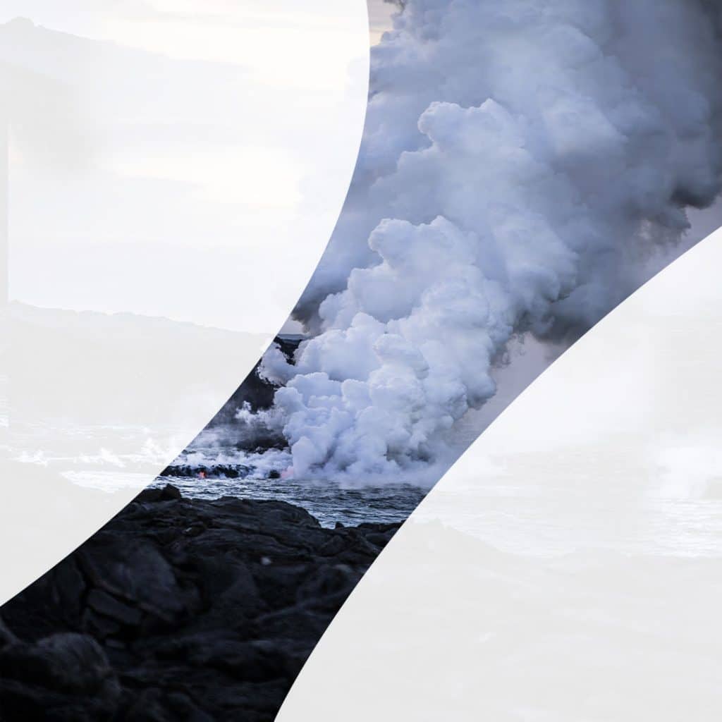 Volcano lava making steam with river